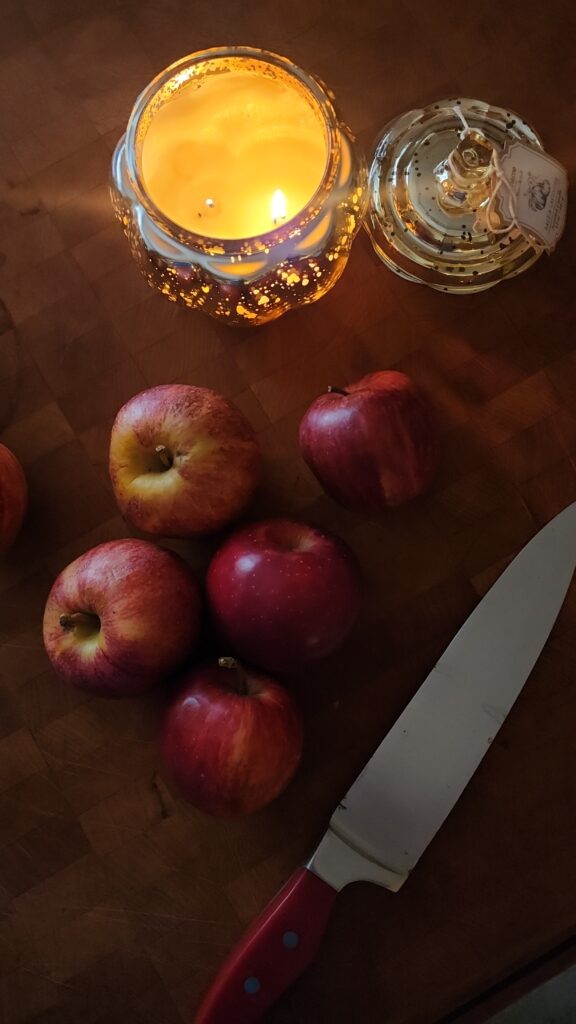 fresh red apples on a butcher block