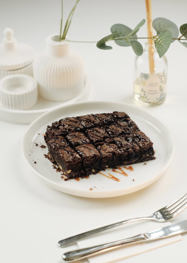 A Slice of a Chocolate Brownie On a Plate