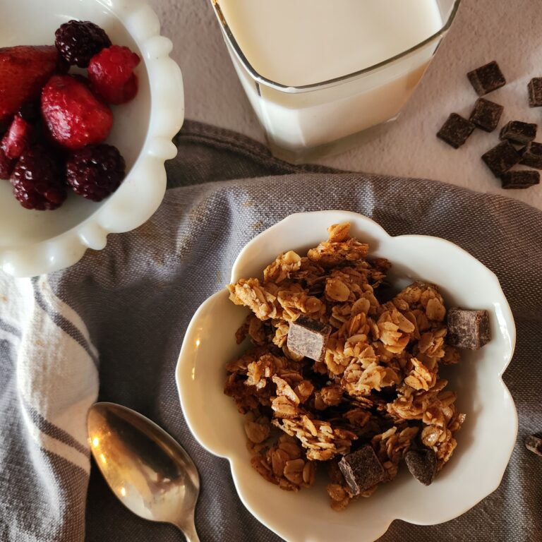 made from scratch granola with dark chocolate chunks and berries