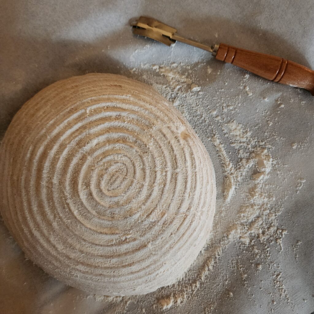 lightly floured made from scratch  sourdough bread 