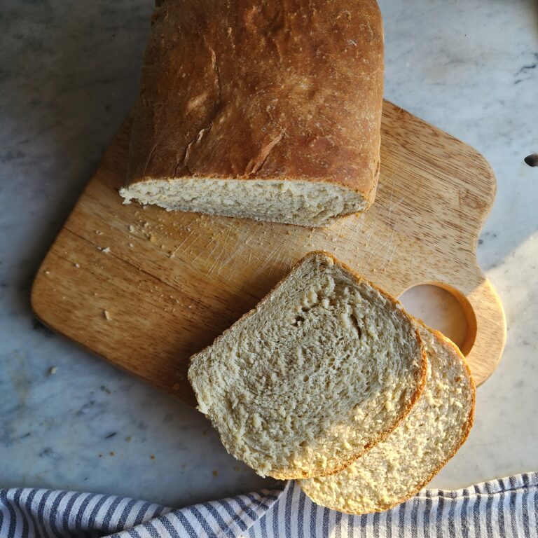 Simple Sourdough Discard Sandwich Bread sliced on a cutting board