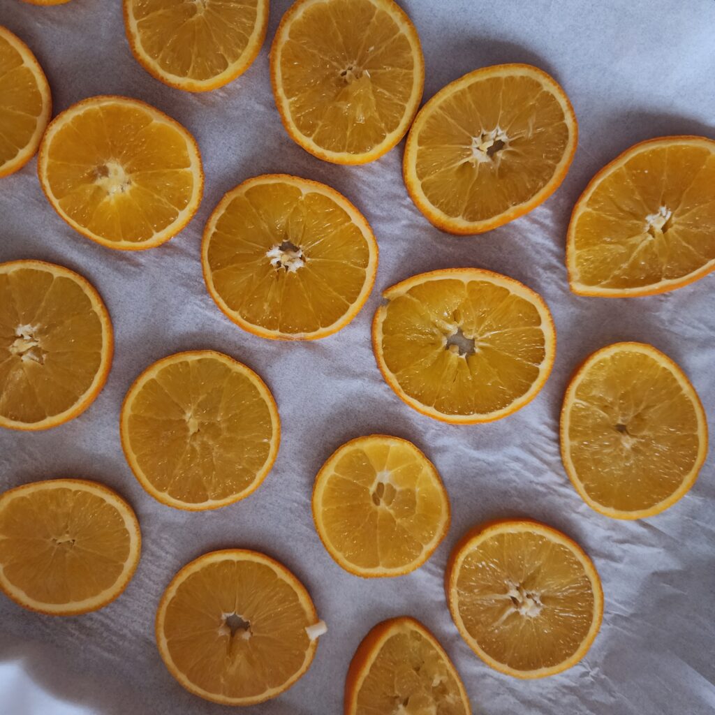 Orange slices ready for drying and used in holiday decor