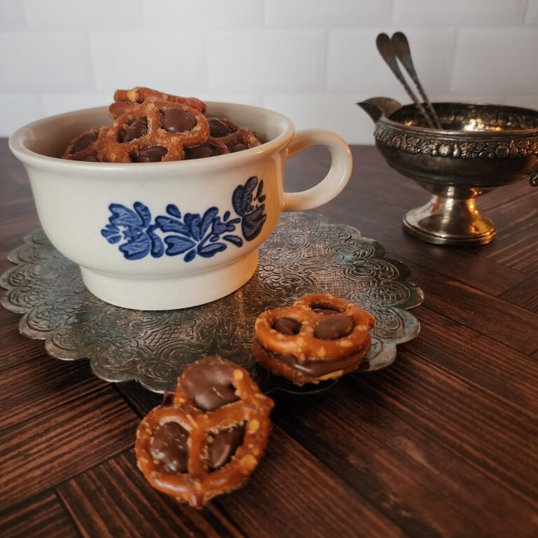 Sweet and salty Christmas candy displayed in a blue and white cup