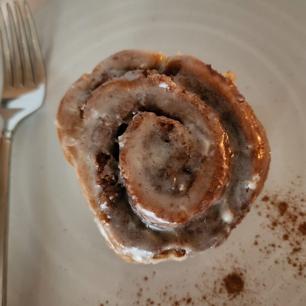 Ready to eat Sourdough Discard Cinnamon Roll on a plate