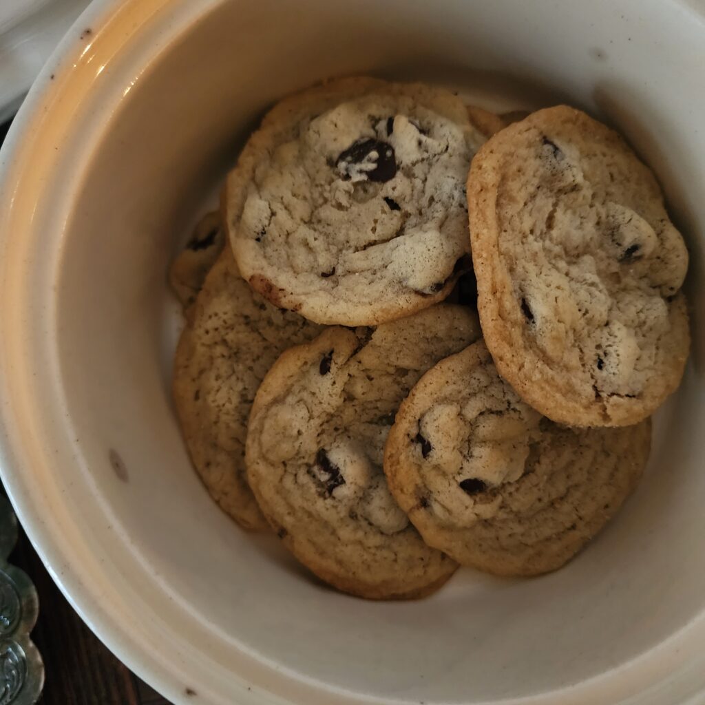 Chocolate Chip cookies sitting in a round baking dish