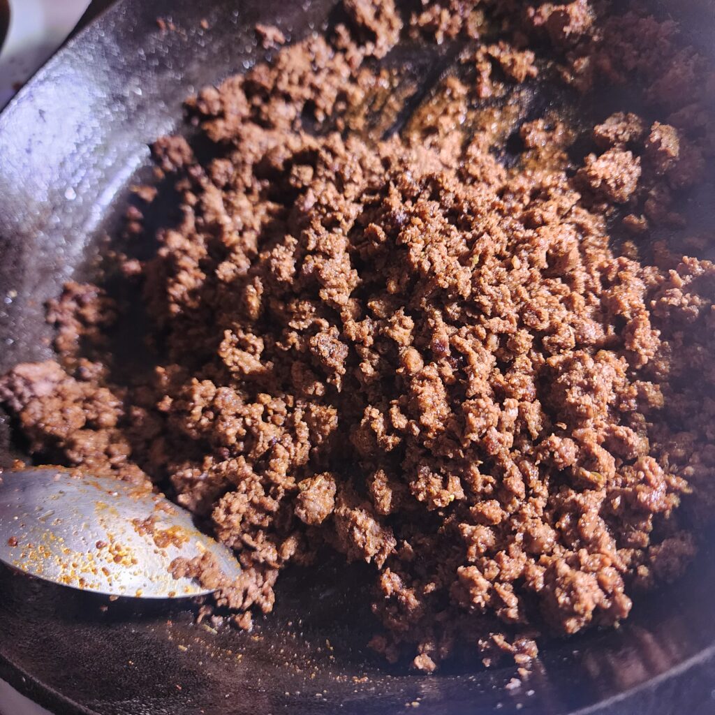 Easy From Scratch Taco Seasoning combined with cooked ground venison.