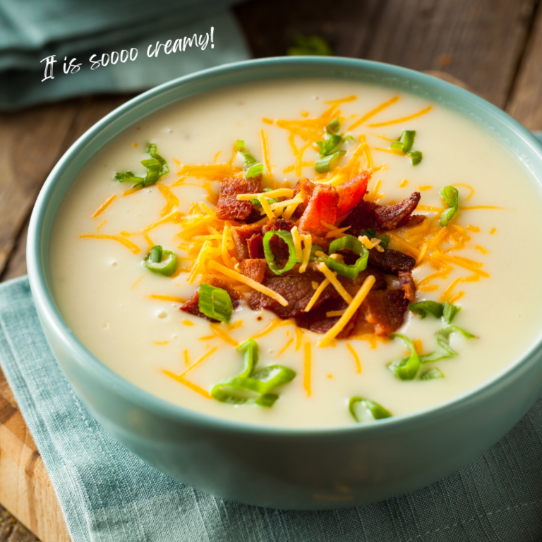 Easy Cheesy Potato Soup in a bowl topped with cheese and bacon