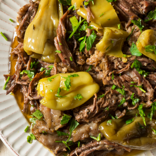 Juicy and tender Mississippi Pot Roast on a white plate