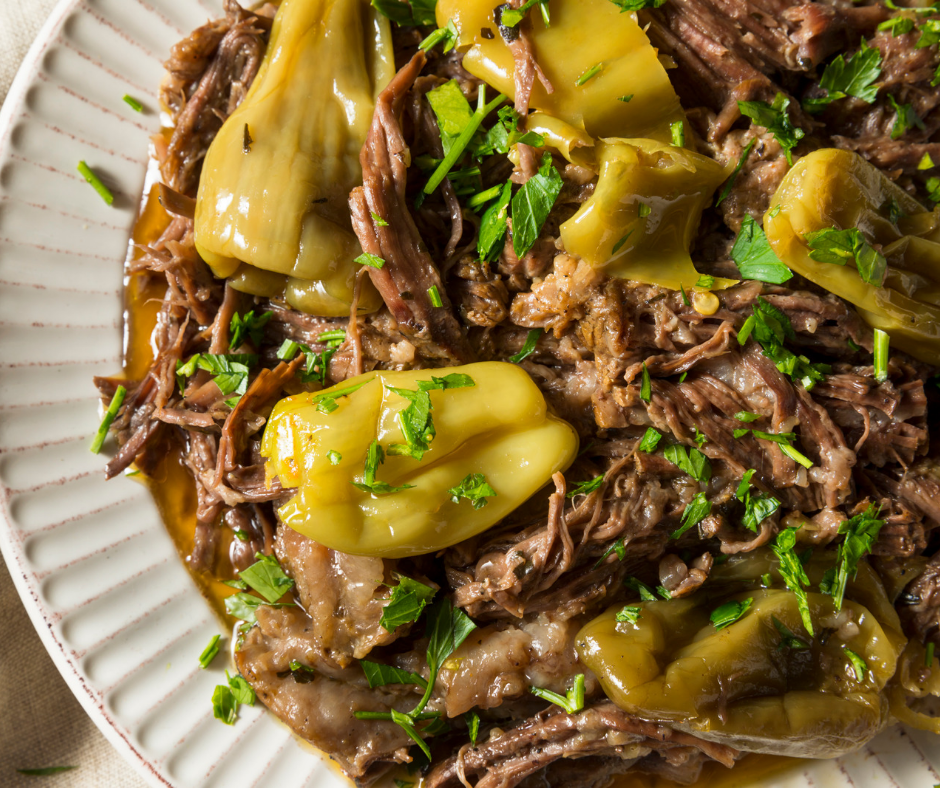 Juicy and tender Mississippi Pot Roast on a white plate