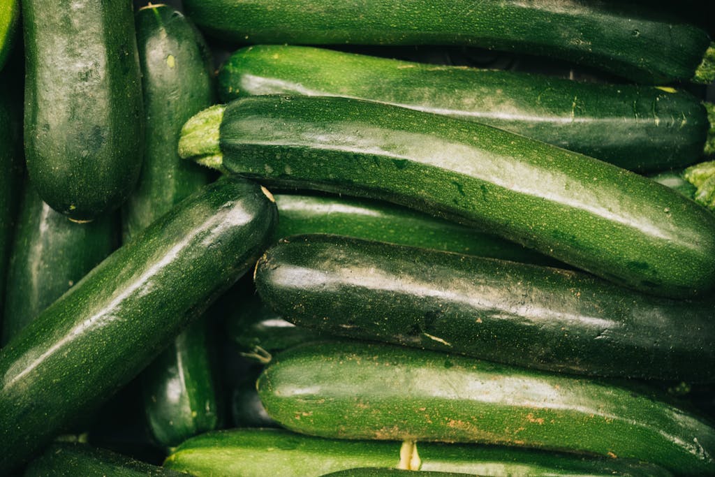 A detailed close-up of fresh green zucchini showcasing their organic quality and nutrition.