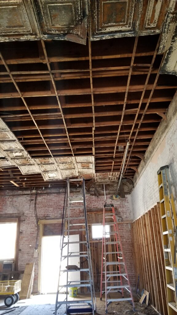 Celing tins removed exposing the wooden furring strips used for installing antique pressed ceilings 