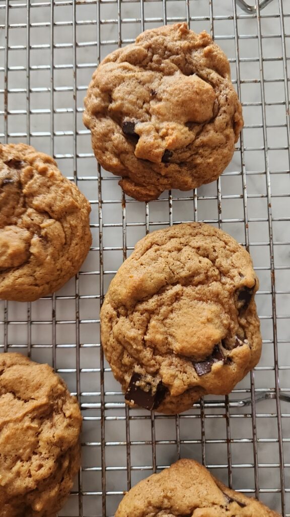 Brown Butter Pumpkin Chocolate Chip Cookies Cooling On A Wire Rack
