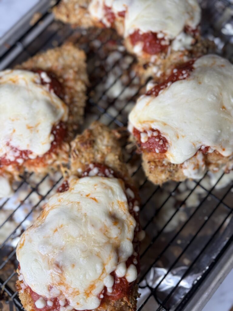 Homemade breaded chicken with marinara sauce and mozzarella cheese. 