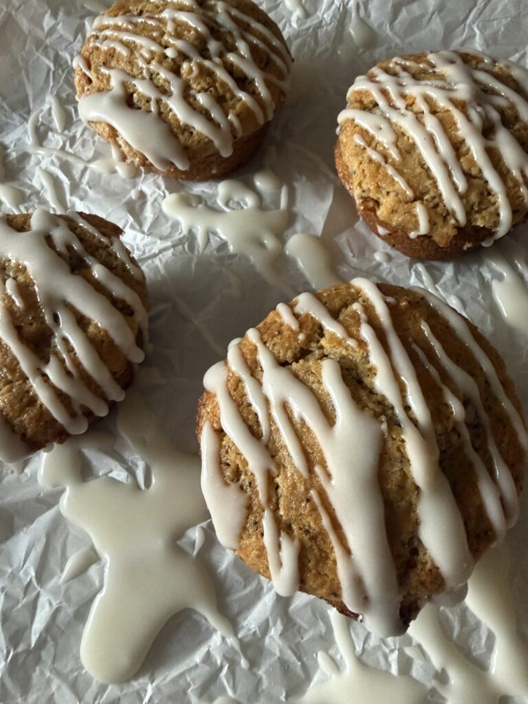 Lemon poppy seed muffins with sweet lemon glaze.