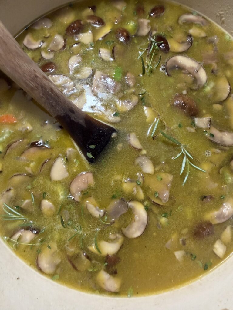 Fresh Rosemary and Thyme are added to the soup base.
