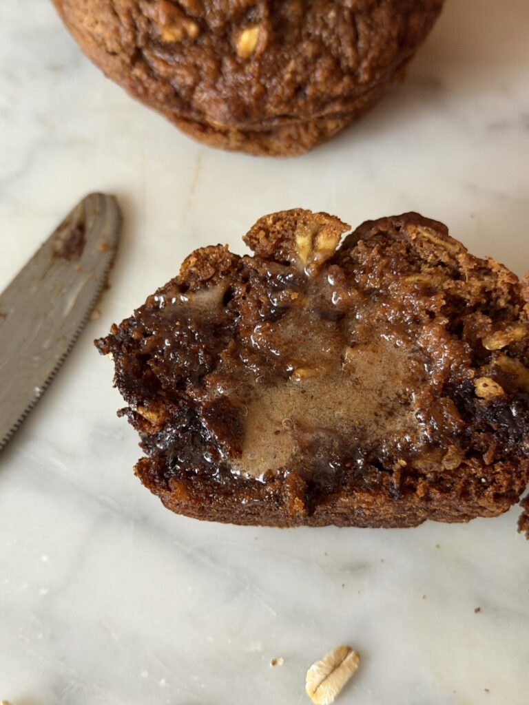 Melted cinnamon sugar honey butter over a warm pumpkin oat muffin with melted chocolate