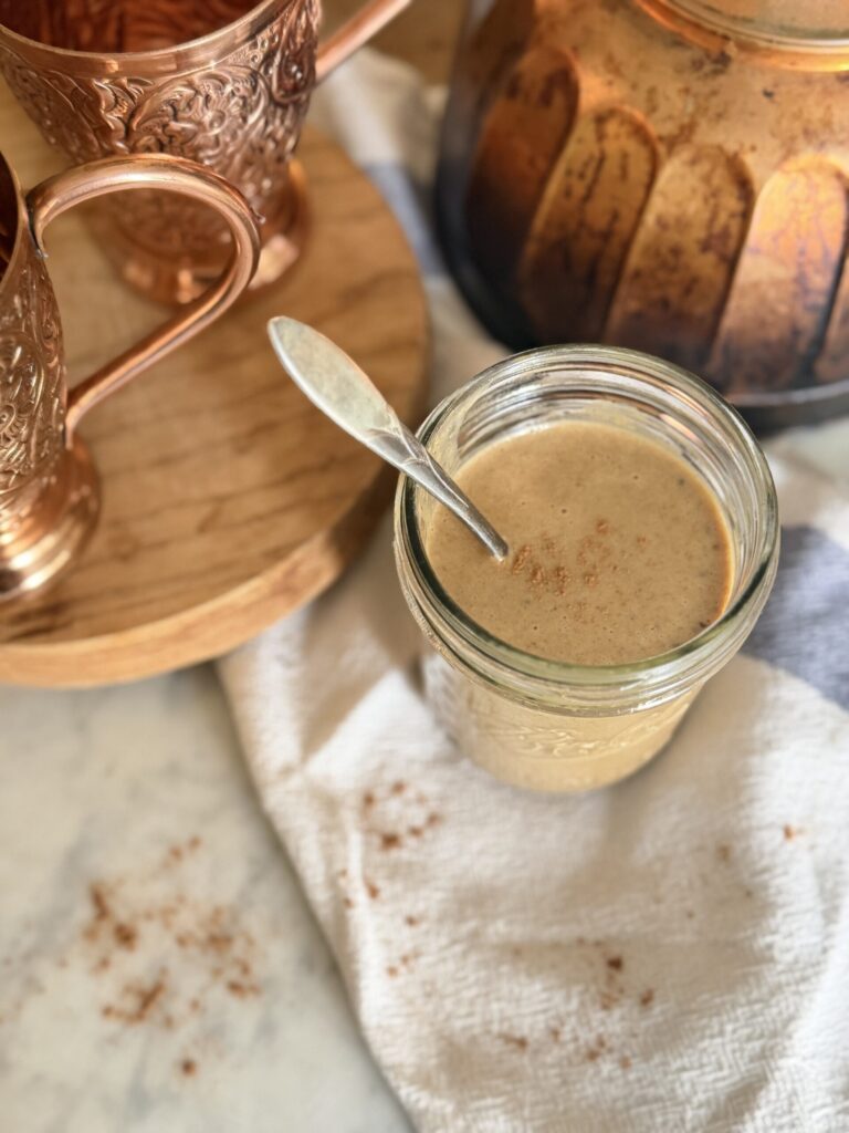 A cold iced fall beverage featuring homemade pumpkin sauce