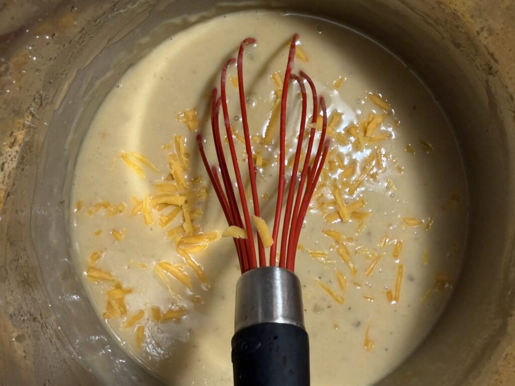 Freshly grated sharp cheddar cheese is added to make Beer Cheese  Soup