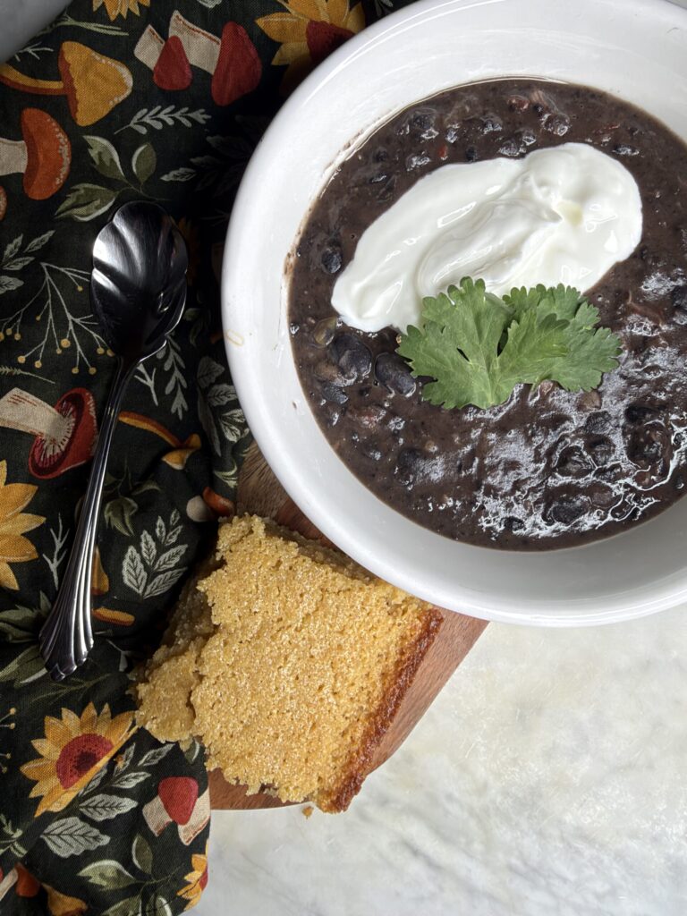 Sourdough cornbread is served alongside Cuban black bean soup